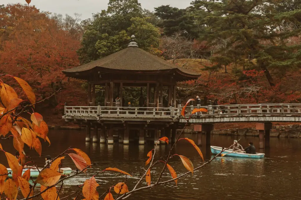 A pond and gazebo in Nara Park in. Kansai Japan in Autumn