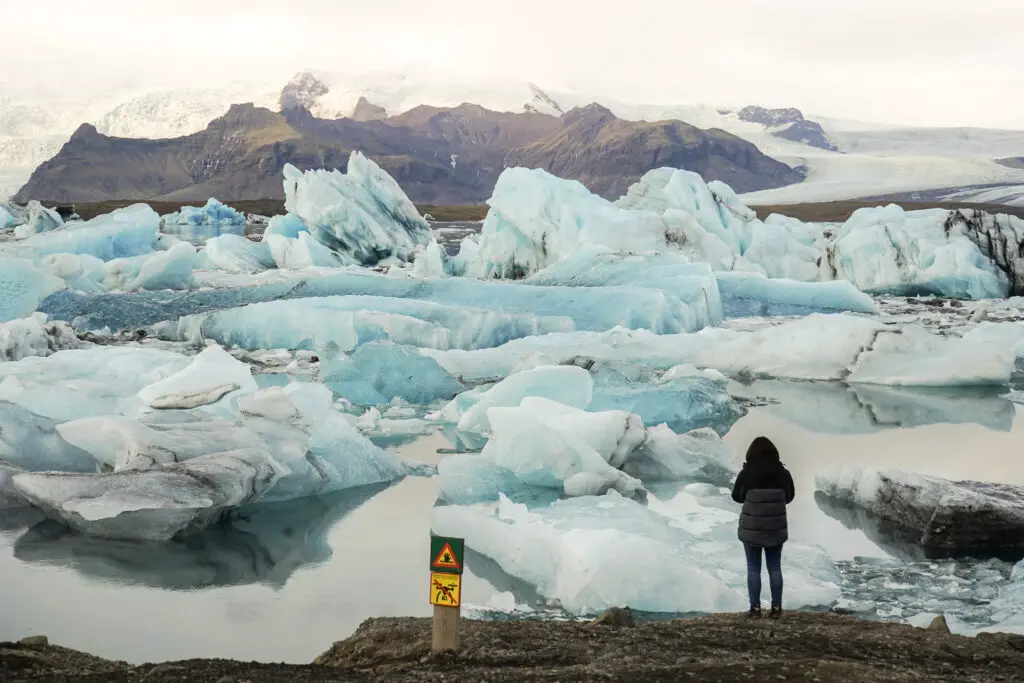 travel photos in iceland with icebergs in the glacier lagoon