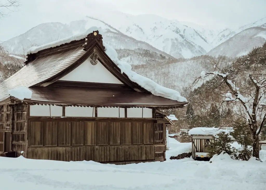 a temple in the snow in japan
