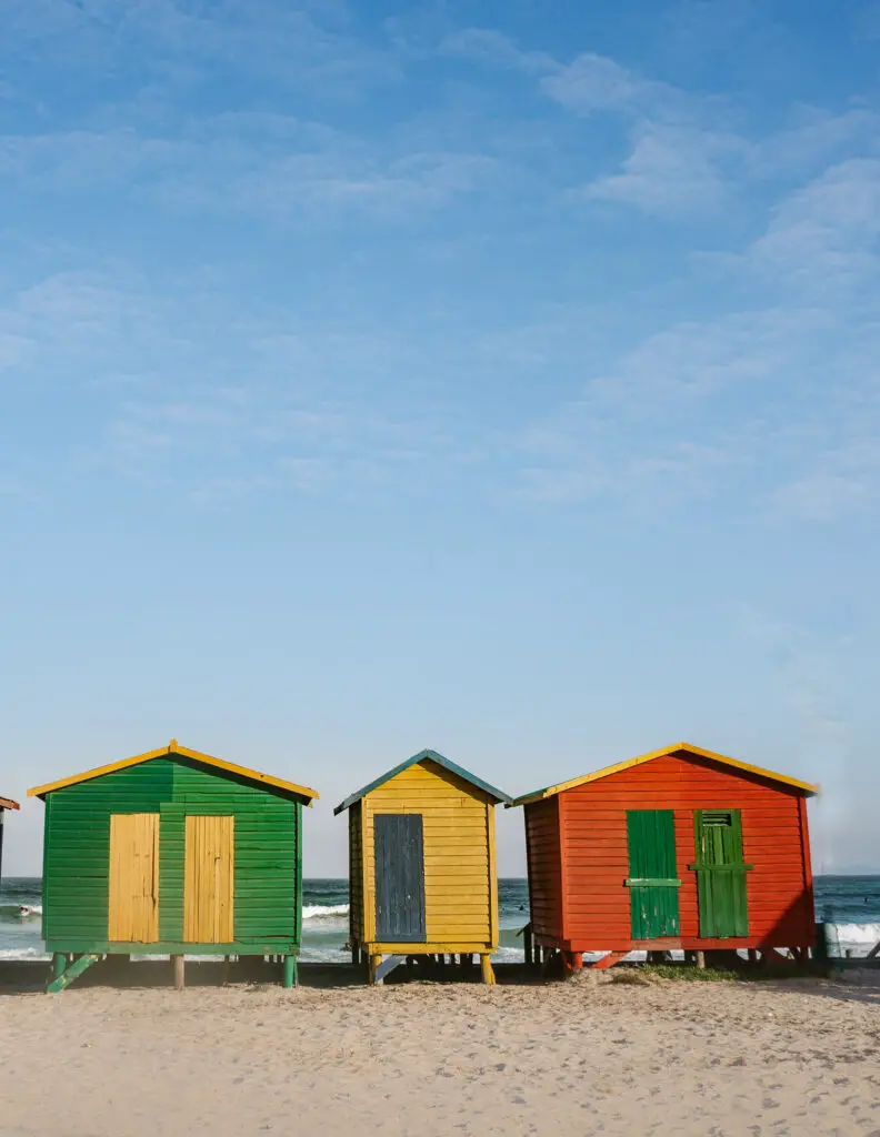 3 colorful huts on muizenberg beach 