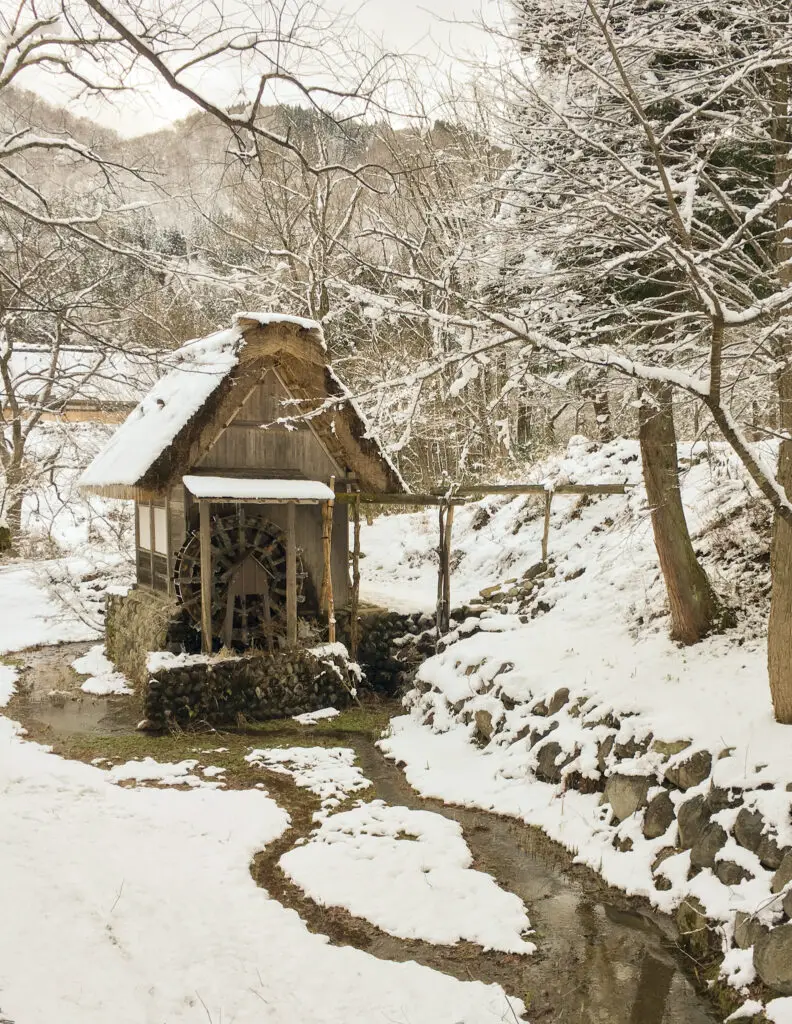 a watermill in shirakawa-go in winter