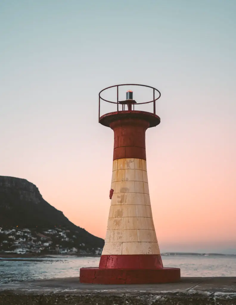 a lighthouse in cape town south africa at sunset 