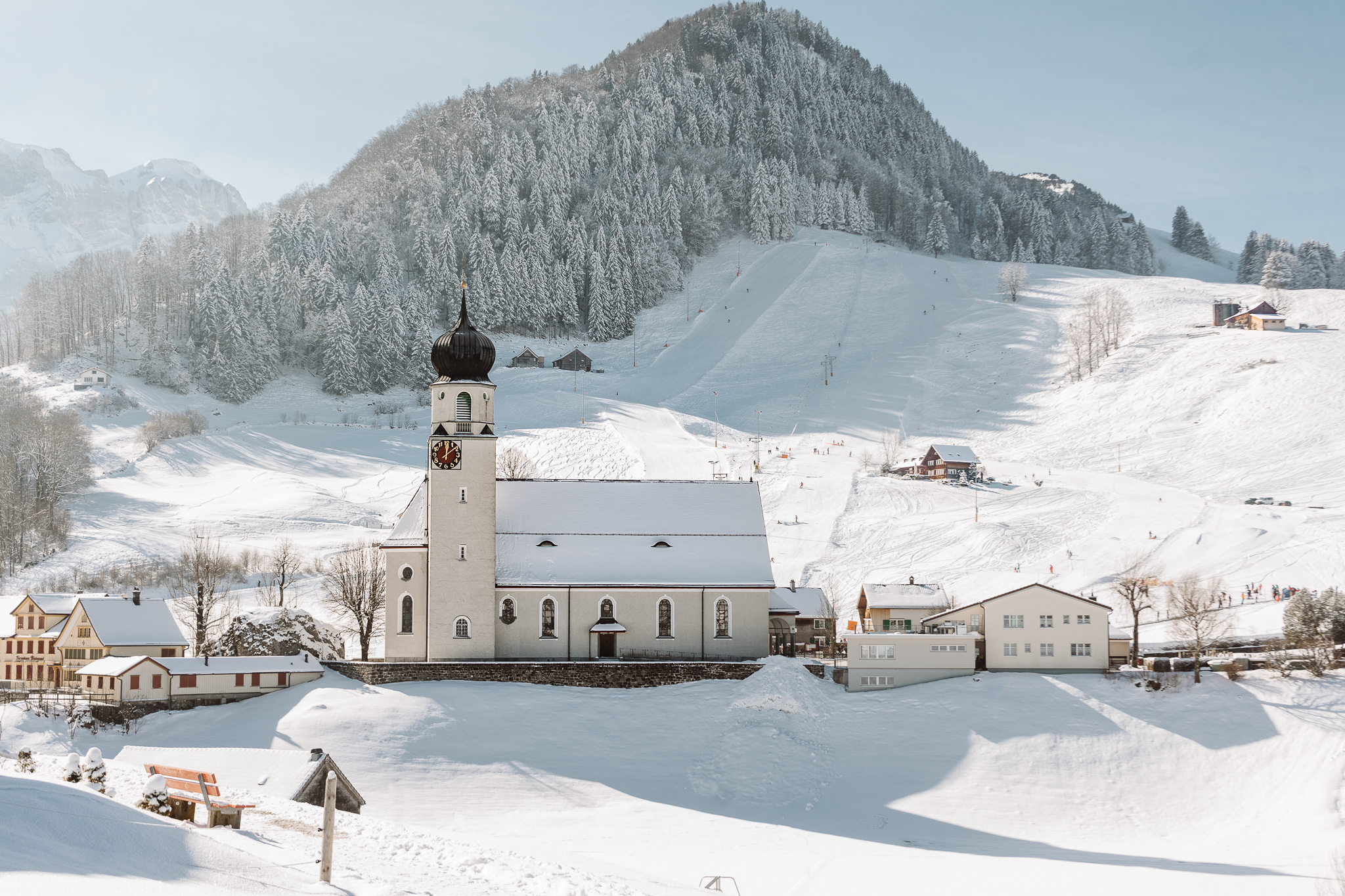 St. Martin Schwende church in appenzell with snow all around