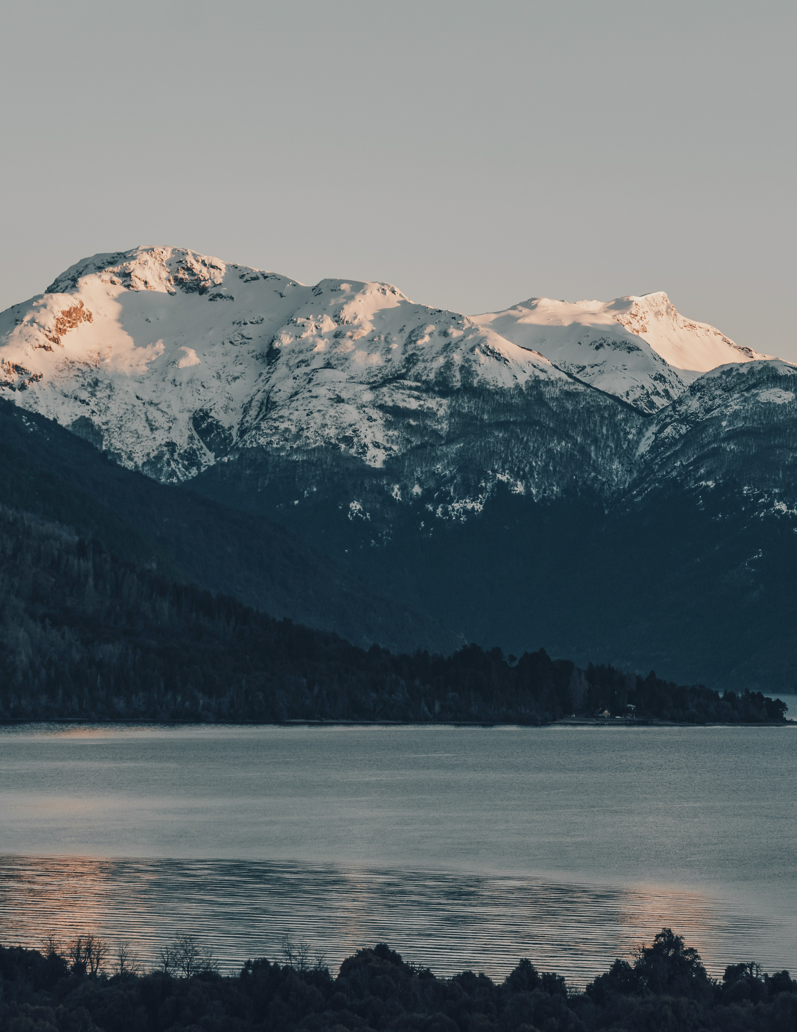 snowy mountains over a lake in poland