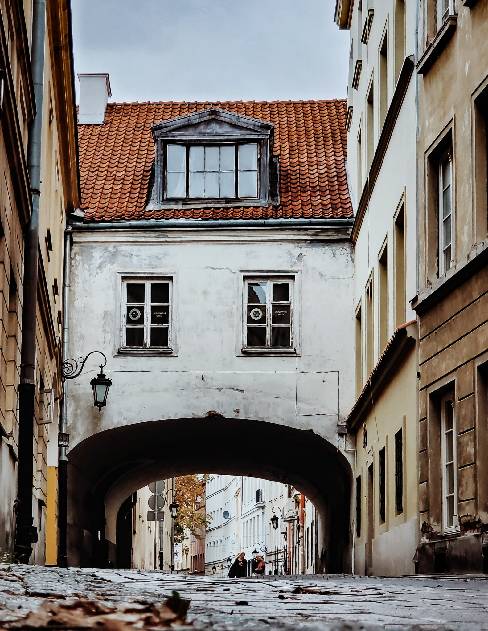 an archway in a city in poland
