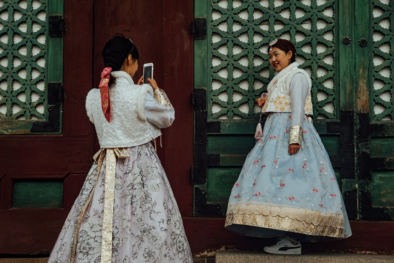 two women wearing hanbok in seoul