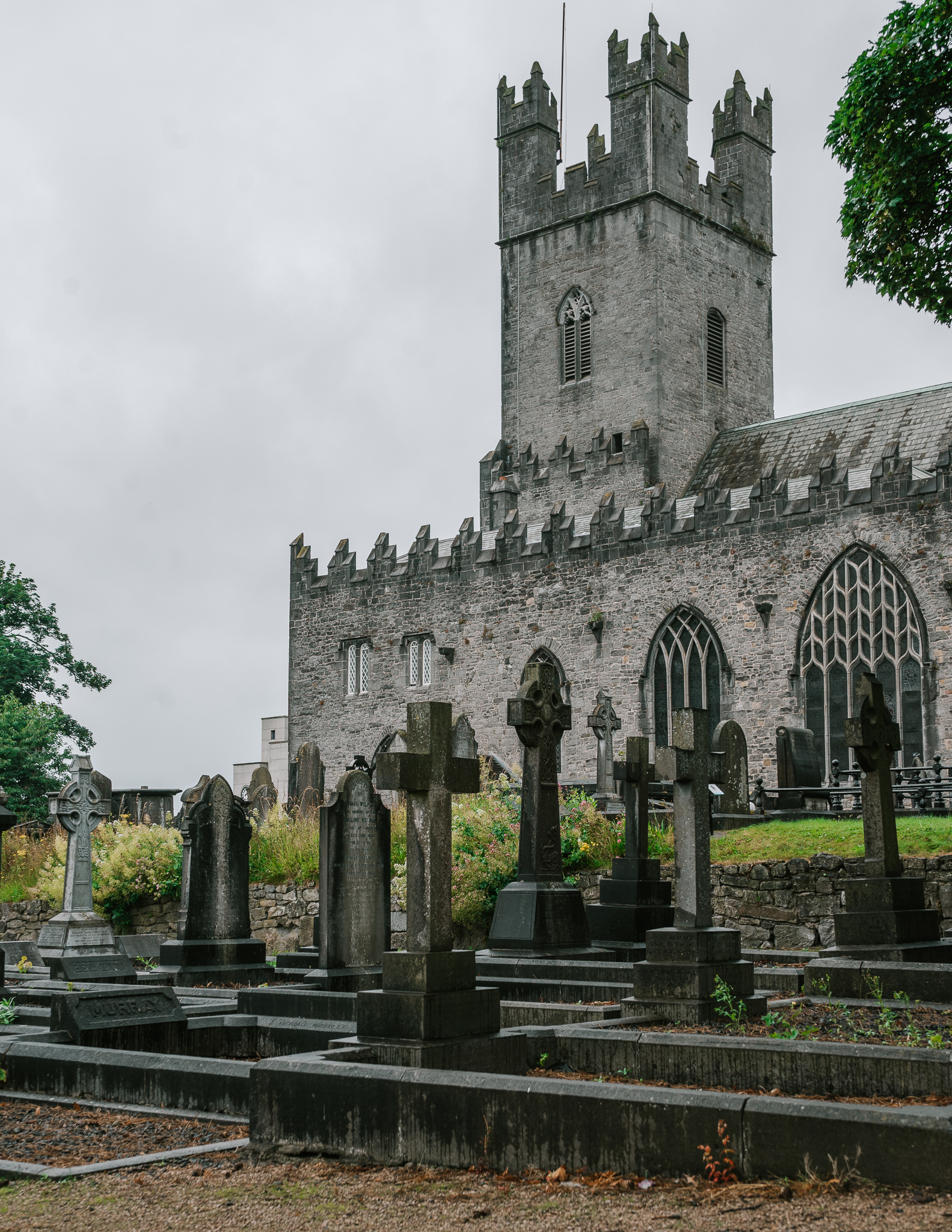A church and cemetery in Limerick, Ireland on a rainy day