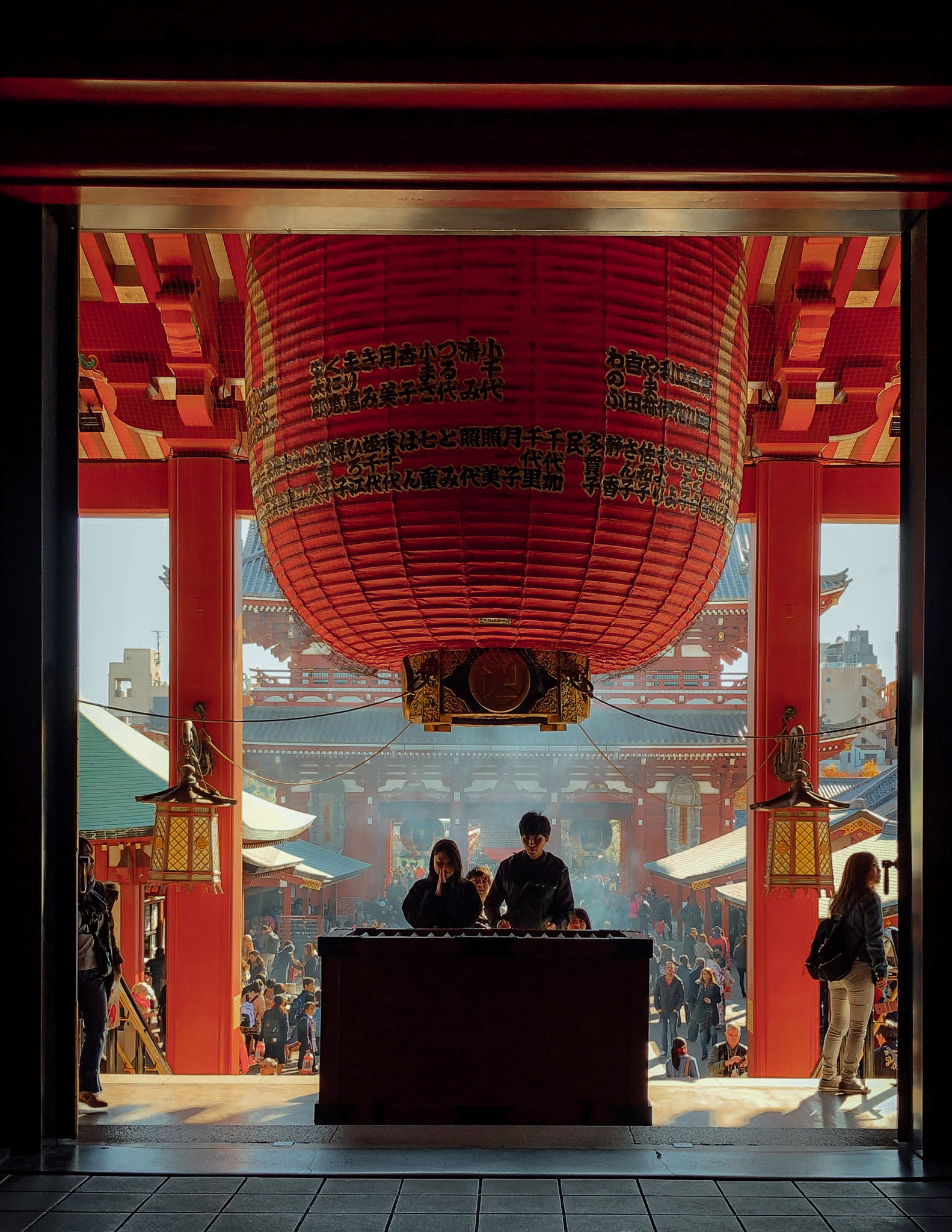 A large lantern in the entrance to a red temple in Otaru in Hokkaido in summer