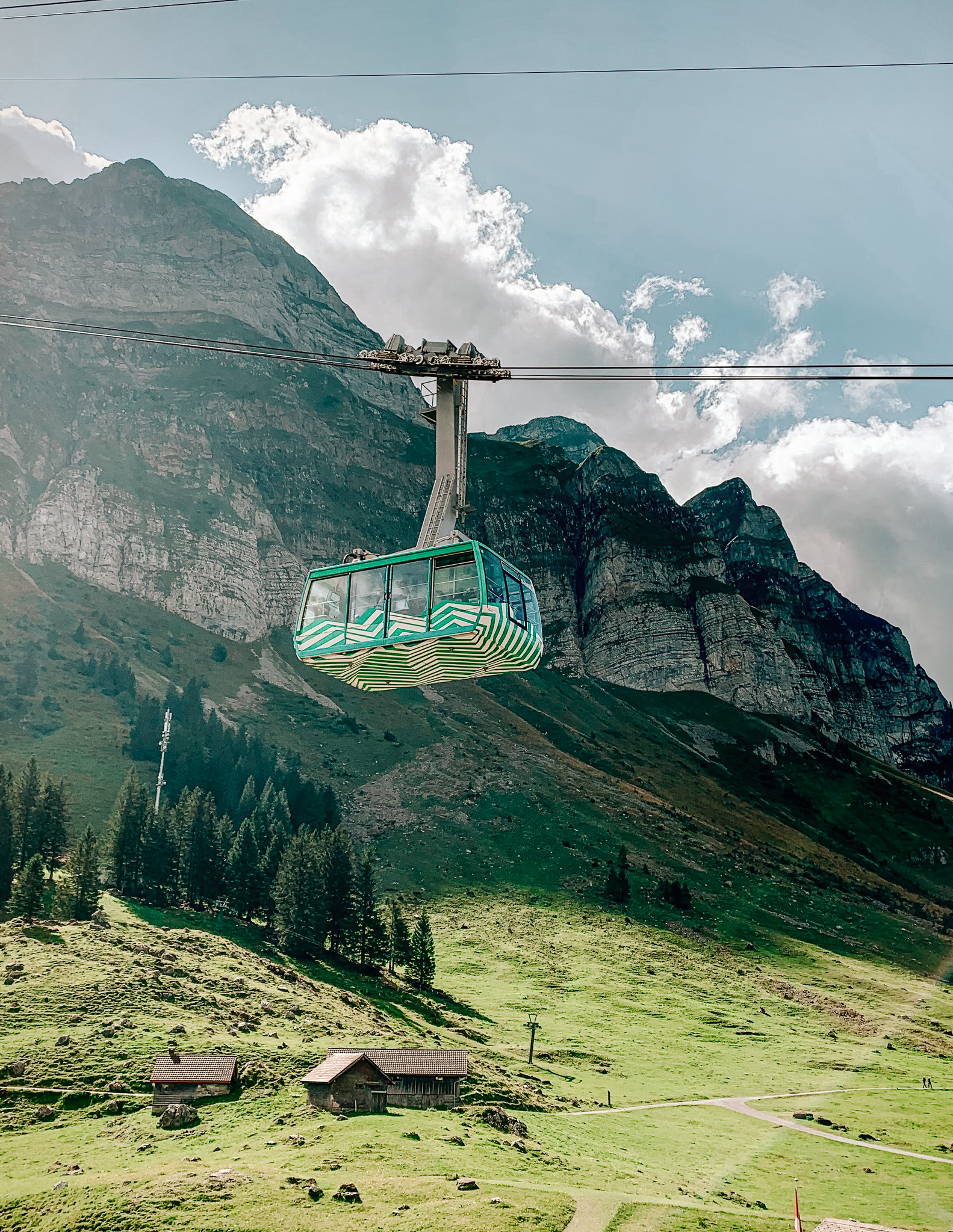 A green cablecar in appenzell switzerland