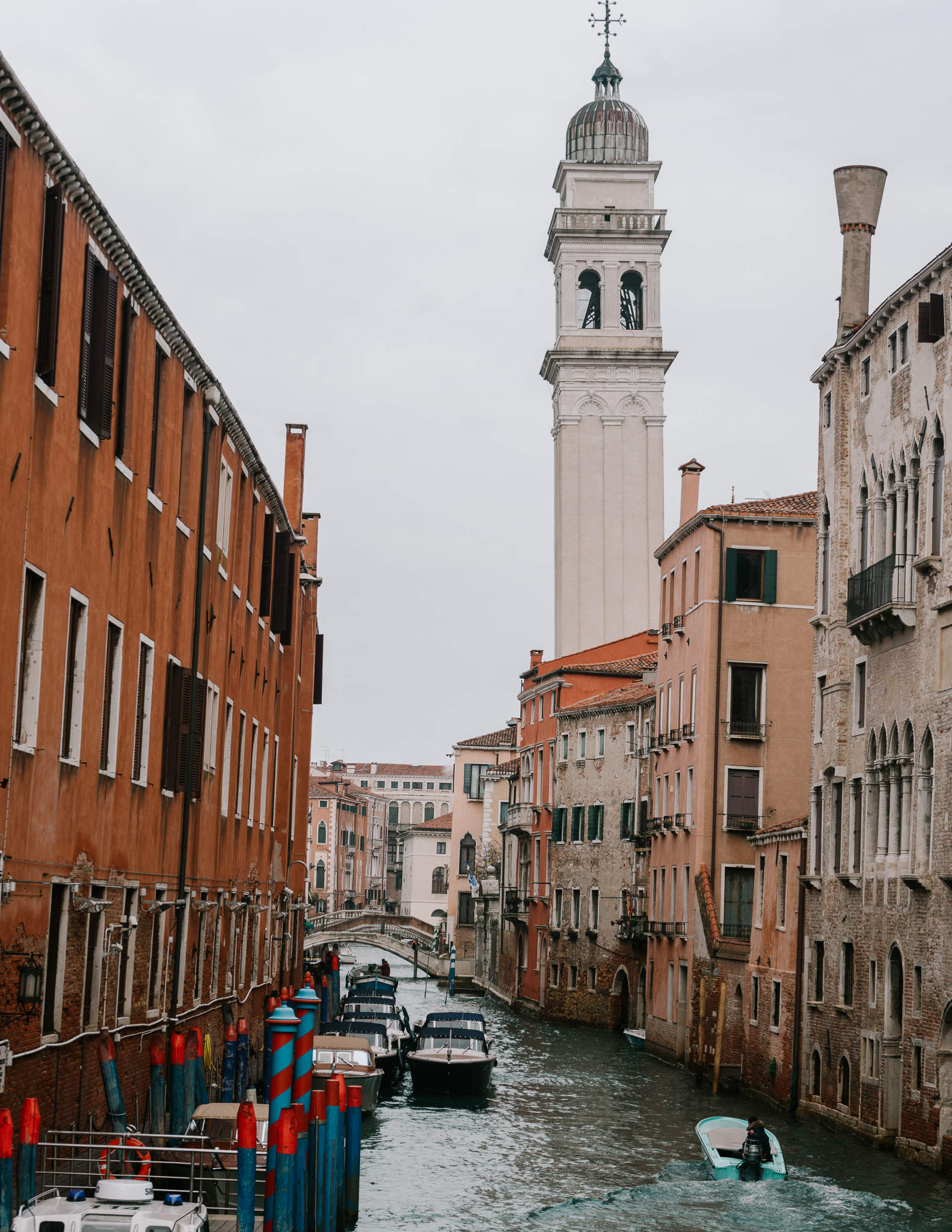 view of a tower and a canal in Venice in fall