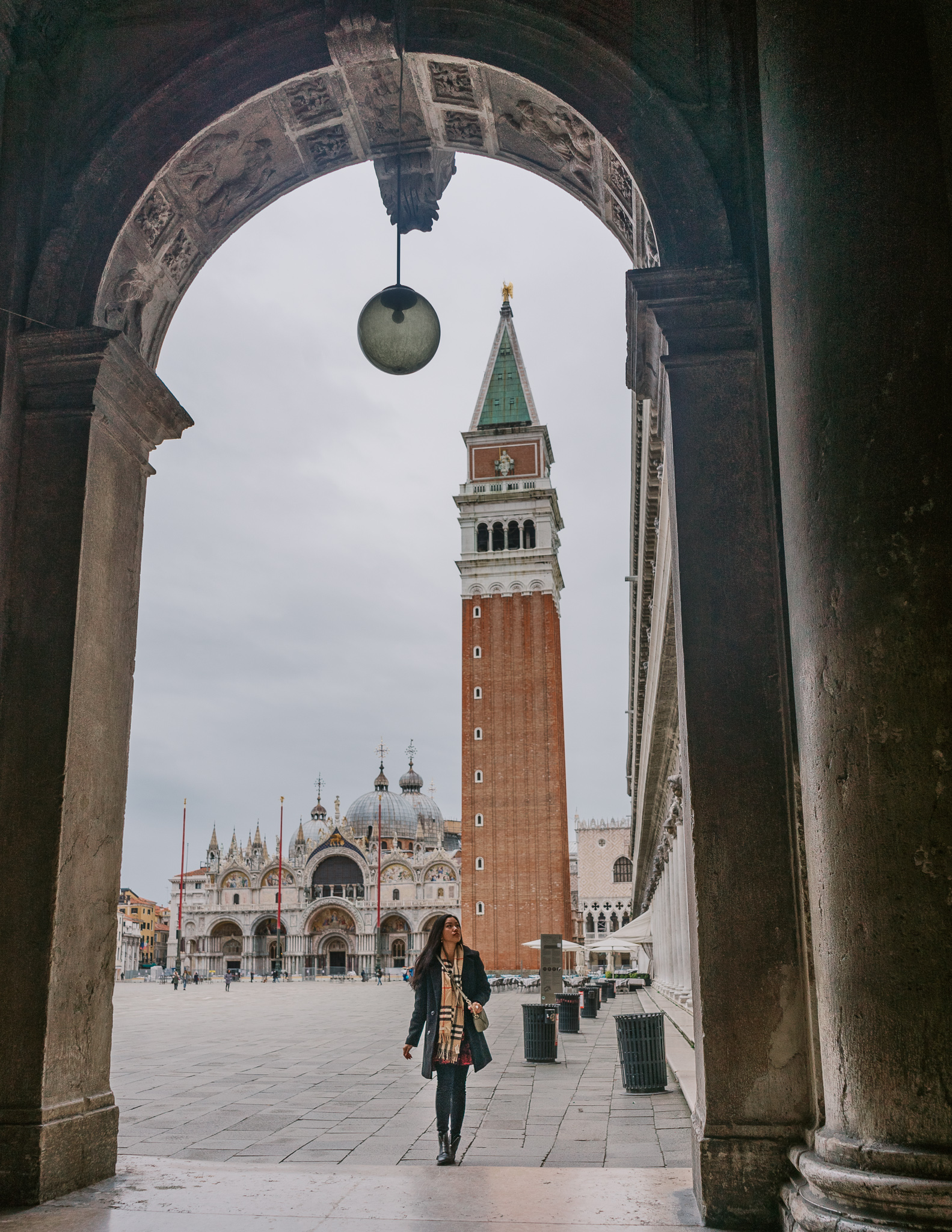 view of San Marco bell tower view from under an arch in Venice in Fall