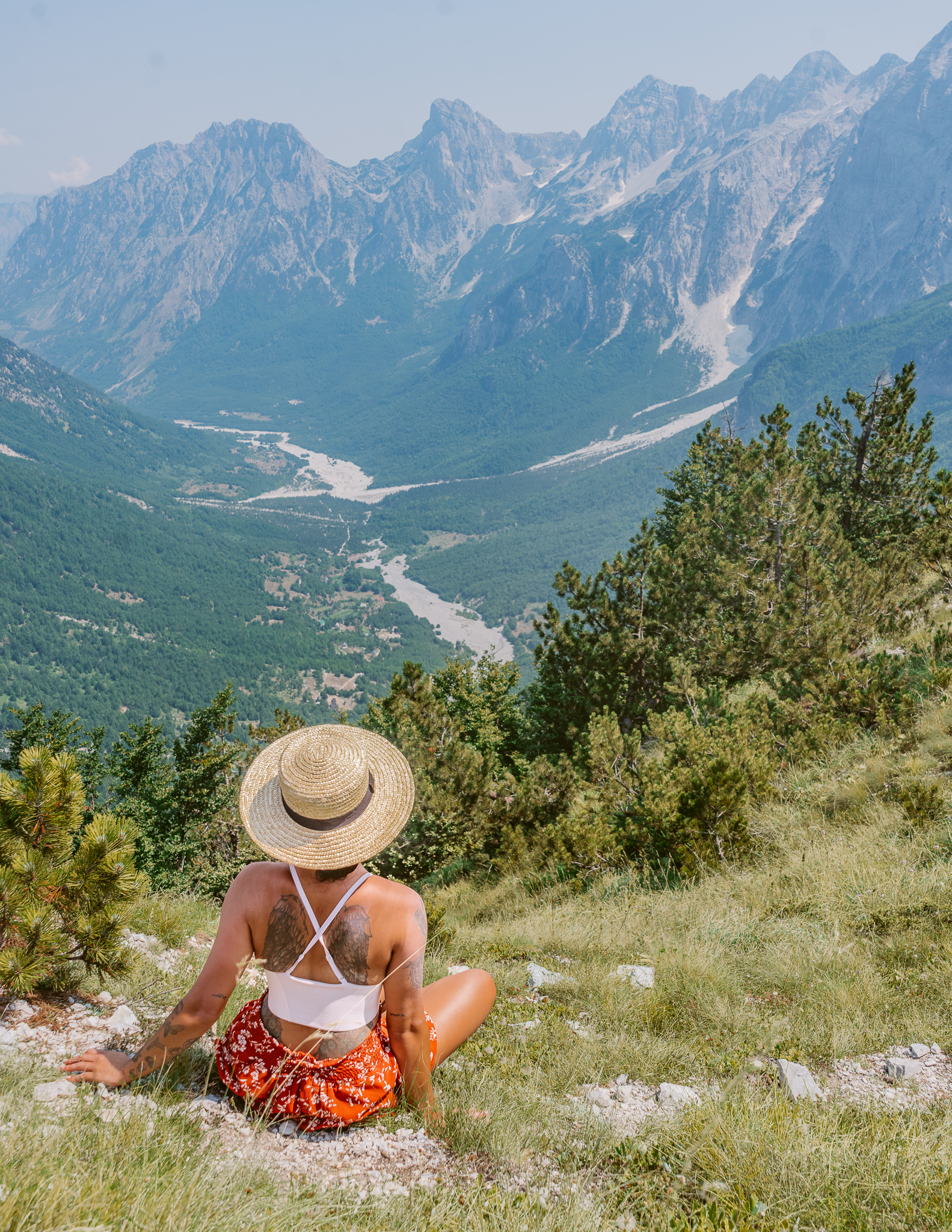 A girl overlooking the valley from the Valbona Pass on the Theth to Valbona trail