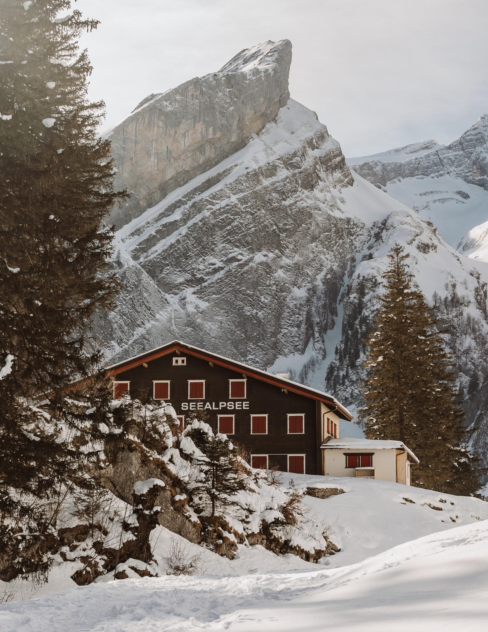 snowy mountains and mountain hut in Appenzell, Swizterland