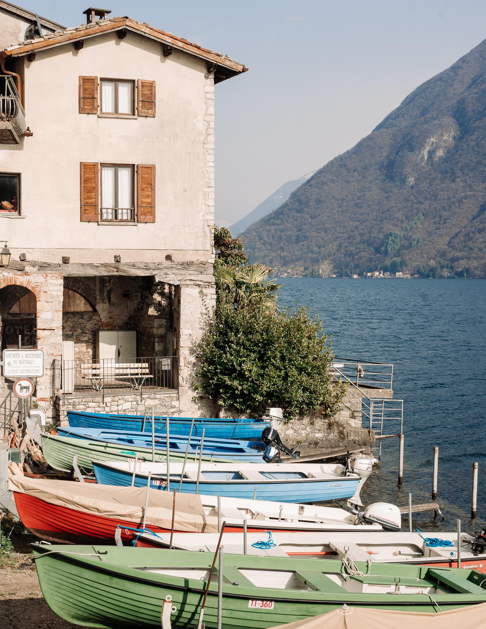 boats alongside Lugano lake in Gandria Ticino, Switzerland
