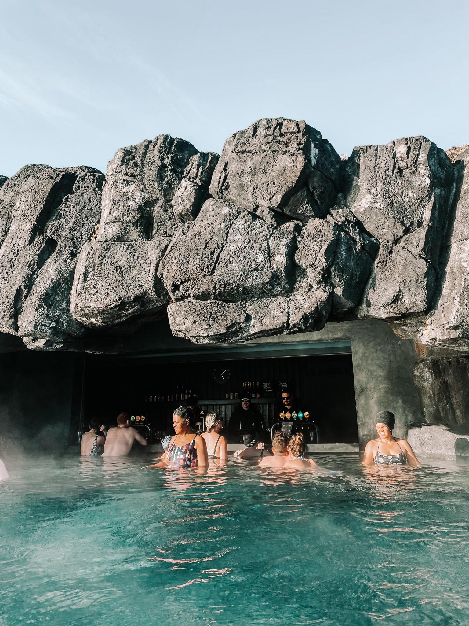 A swim up bar in a cave at the Sky Lagoon in Iceland