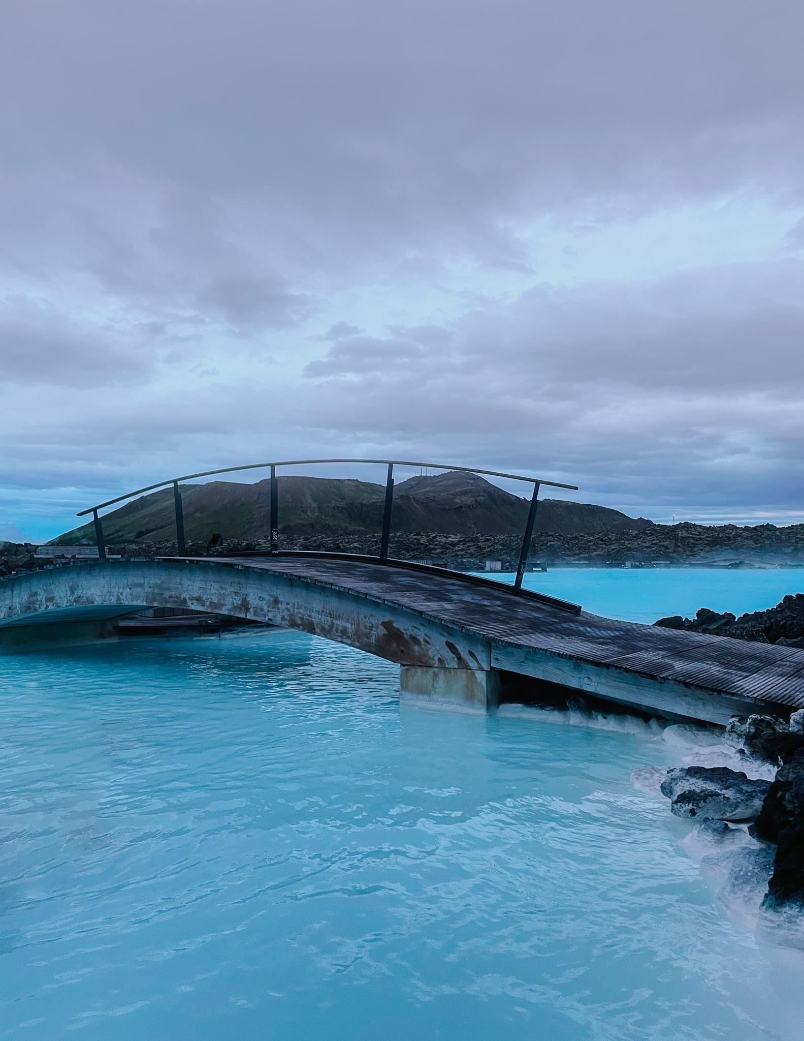 Blue Lagoon pool in Iceland and a wooden bridge.